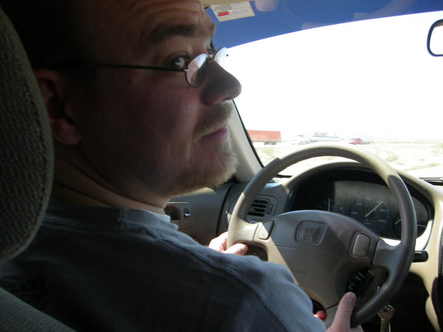 What?  You want my picture?  Ok.  Let me turn around while we're going 80 mph down the freeway.  What's that?  An accident ahead?  OH MY GOSH!